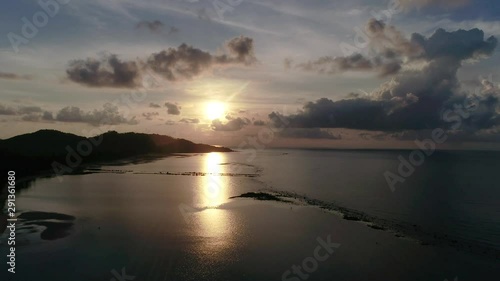 Wallpaper Mural Aerial photo of sunrise over the ocean on a tropical island Torontodigital.ca