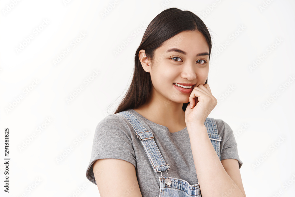 Close-up tender feminine beautiful lovely asian girl stand half-turned touch cheek softly grinning silly laugh camera look shy modest romantic sensual gaze standing happily white background Close-up tender feminine beautiful lovely asian girl stand half-turned touch cheek softly grinning silly laugh camera look shy modest romantic sensual gaze standing happily white background