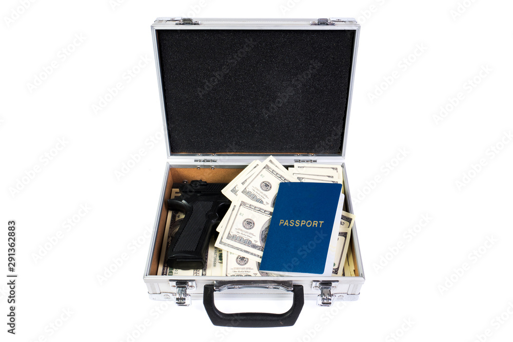 Money, gun weapon and passport in a metal suitcase. Money, gun weapon and passport in a metal suitcase.