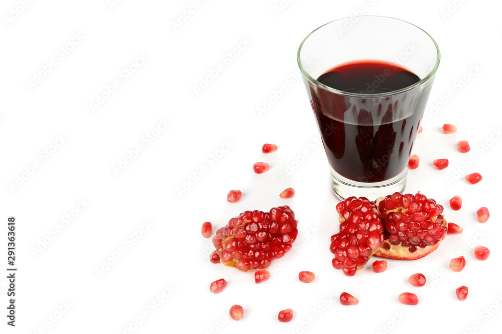 Glass of pomegranate juice with fruit isolated on white. Free space for text. Glass of pomegranate juice with fruit isolated on white. Free space for text.