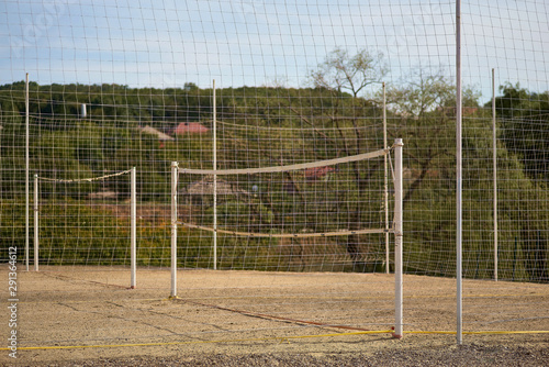Volleyball fields, courts fenced with a net