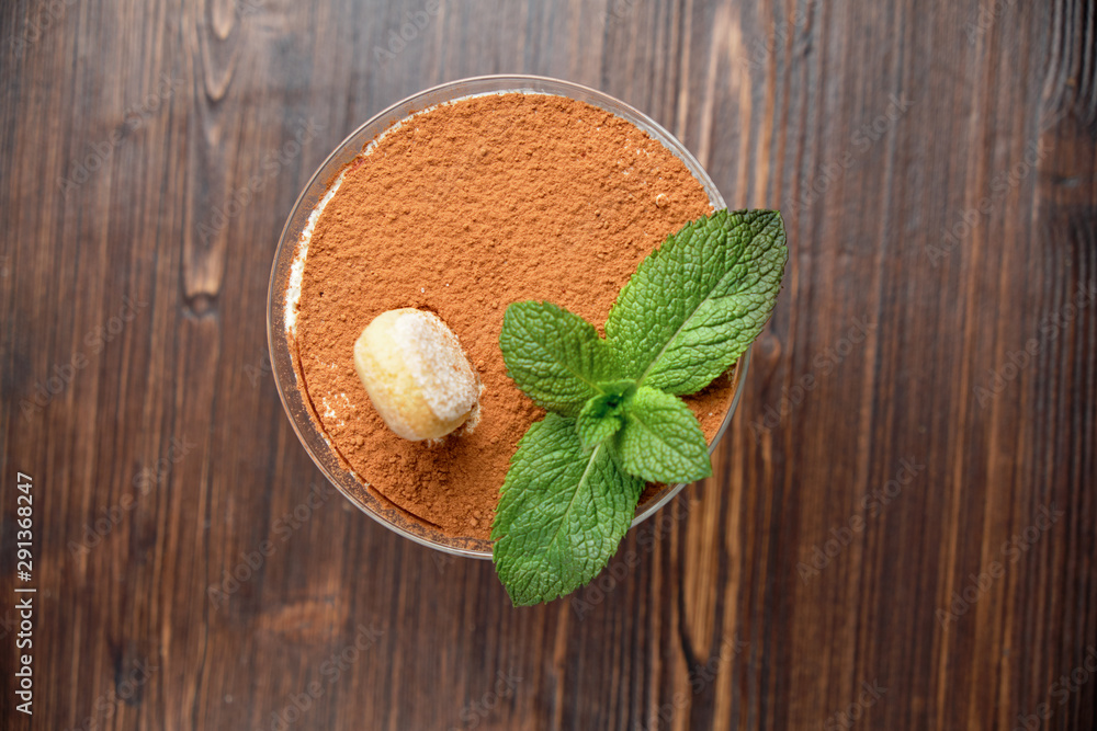 Tiramisu in a glass vase . catering menu Tiramisu in a glass vase . catering menu