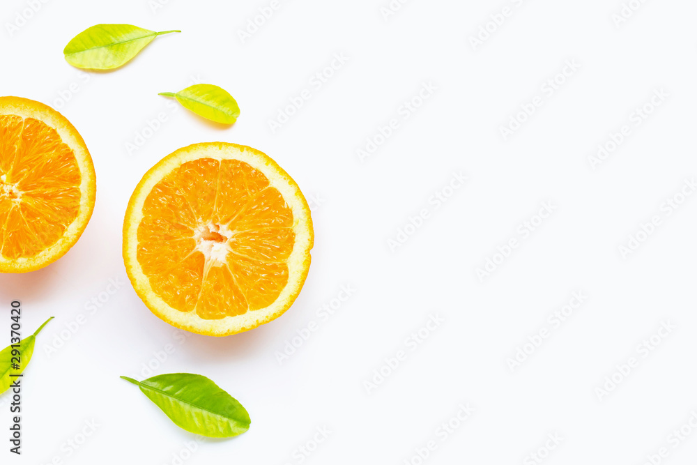 Fototapeta premium Fresh orange citrus fruit with leaves isolated on white background.
