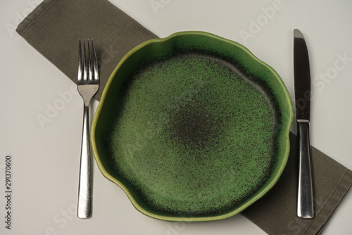 table setting: fork, knife, plate, handbrake