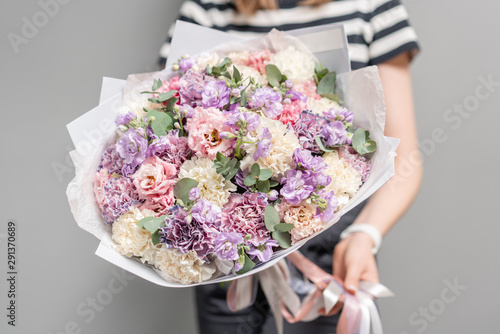 Wallpaper Mural Beautiful bouquet of mixed flowers in womans hands. the work of the florist at a flower shop. Delicate Pastel color. Fresh cut flower. Torontodigital.ca