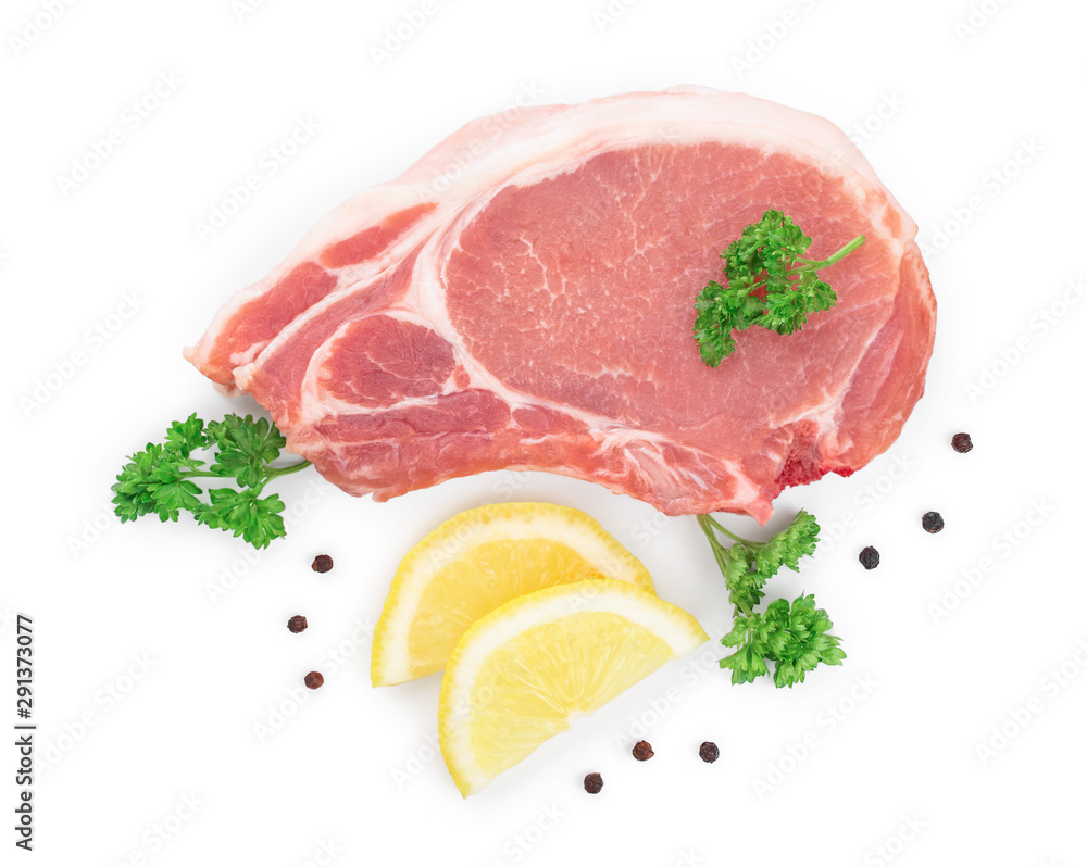 sliced raw pork meat with parsley and lemon isolated on white background. Top view. Flat lay sliced raw pork meat with parsley and lemon isolated on white background. Top view. Flat lay