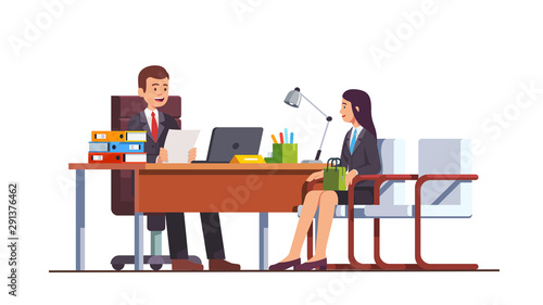 Boss holding CV and meeting job applicant woman
