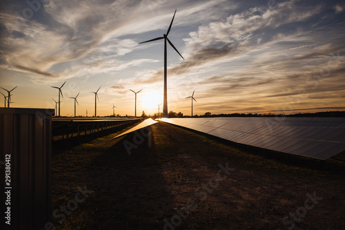 wind turbines and solar panels on a field in Germany
