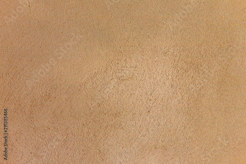 yellow-red rough wall of lime plaster