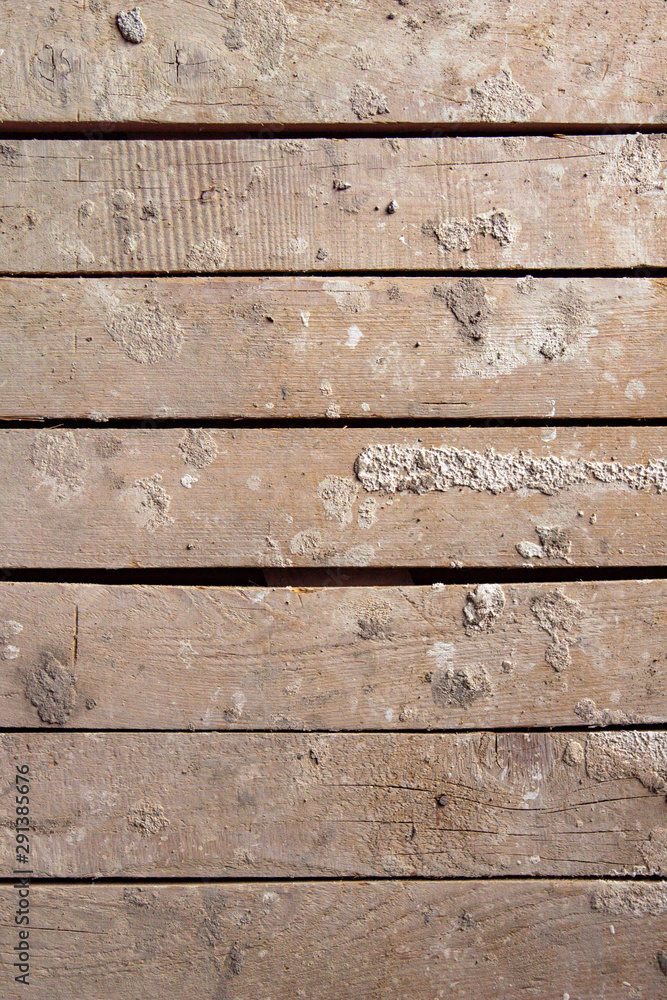 Fototapeta premium grunge background: rough board of oak planks stained with lime and paint
