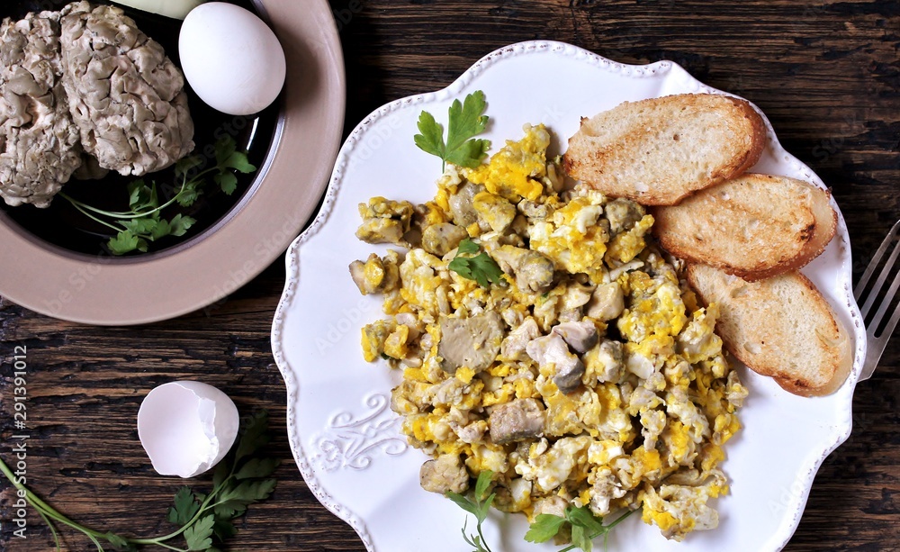 Scrambled eggs with brains of a cow, calf or sheep.The recipe for a