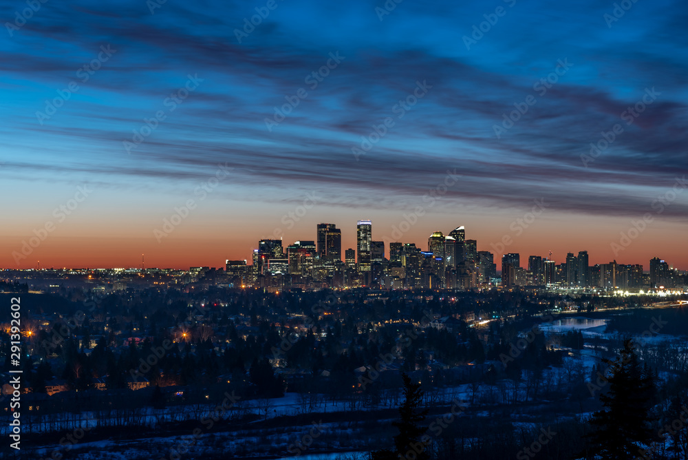 Calgary's skyline at sunrise. 