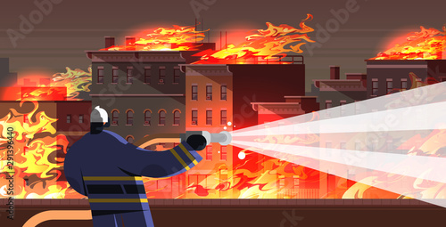 brave fireman extinguishing flame in burning house firefighter in uniform and helmet spraying water to fire firefighting emergency service concept cityscape background flat portrait horizontal