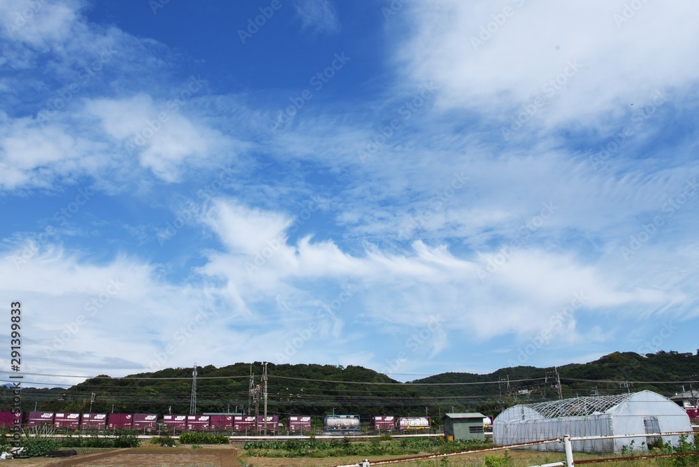 September sky and autumn countryside in Japan. The blue sky and white clouds give a sense of the seasons.