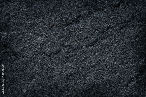 Dark grey black slate stone abstract background or texture