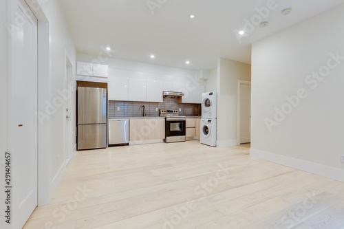 Interior design of a classic living room with kitchen in the newly built house or apartment, basement for rent.