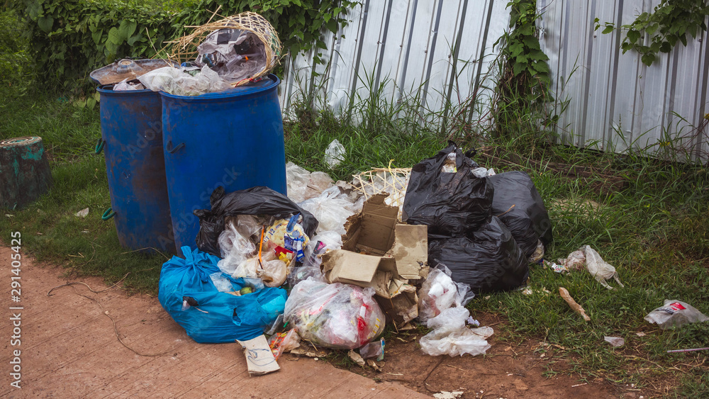 Trash and piles of garbage on the street Trash and piles of garbage on the street
