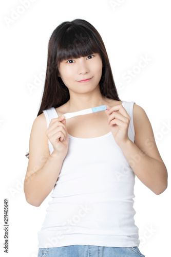 Asian woman holding early pregnancy tester isolated on white background