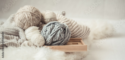 cozy background Wallpaper with the yarn for knitting.