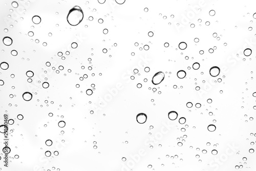 Rain drops on window glasses surface Natural Pattern of raindrops. Natural pattern of raindrops on white background for your design.