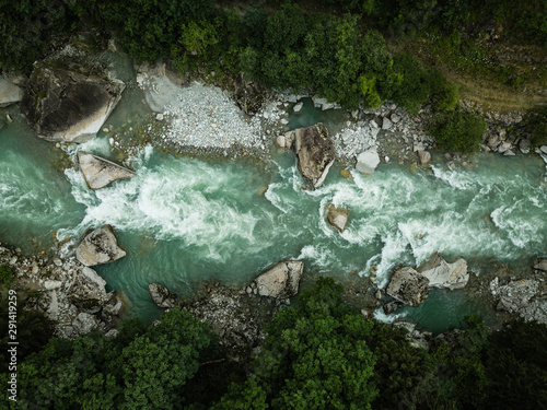 Aerial top view of a splendid mountain river in Swiss Alps