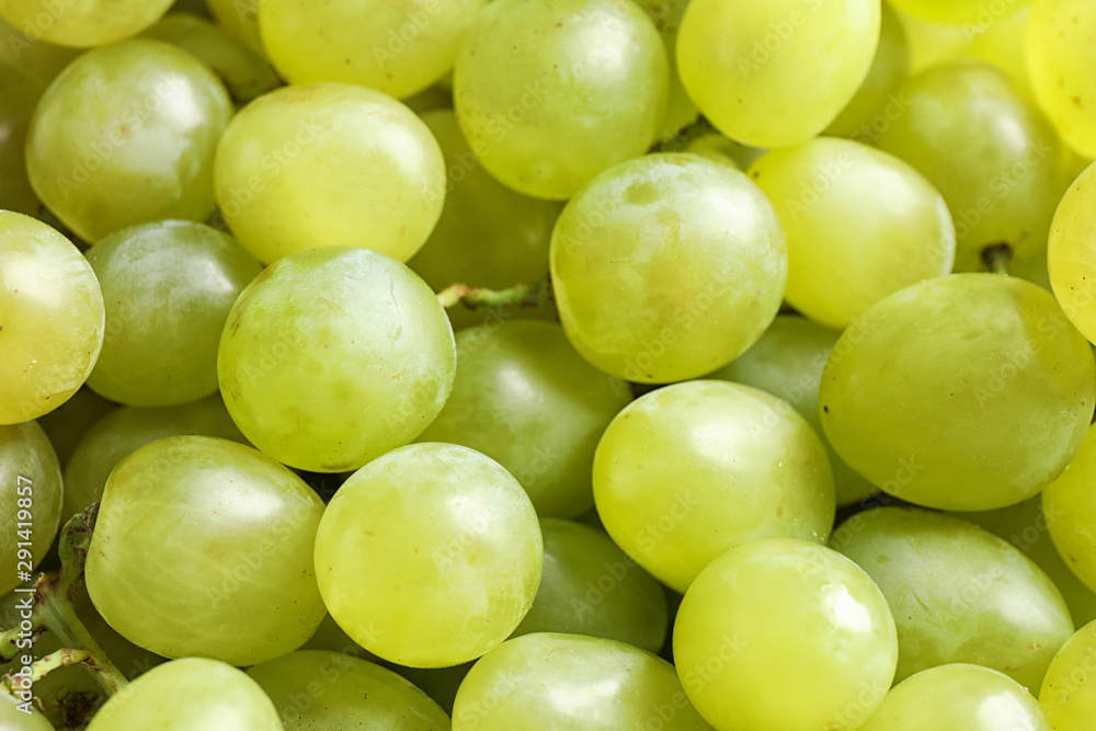 Fresh ripe juicy white grapes as background, closeup view Fresh ripe juicy white grapes as background, closeup view
