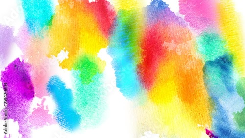 Beautiful multicolor spots appear on a white background. Cyan, pink, yellow, green and blue paints spread on paper forming a background. 4K motion graphic.