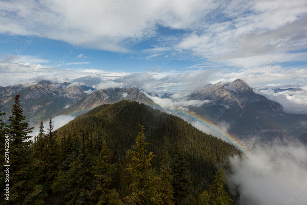 Mountains with Fog and Rainbow