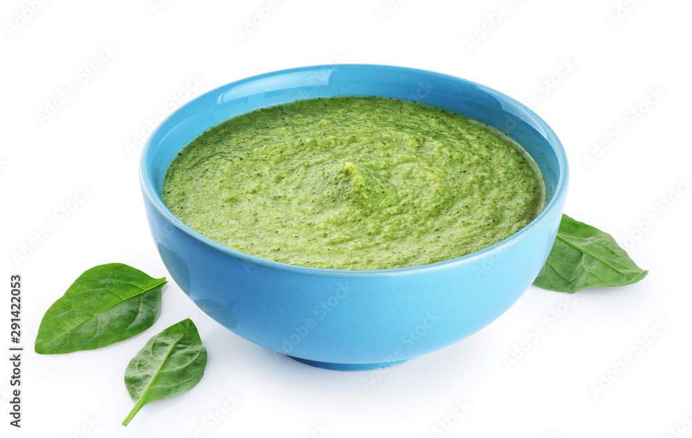 Bowl of green cream soup with pea, broccoli, kale and spinach isolated on white background. Bowl of green cream soup with pea, broccoli, kale and spinach isolated on white background.