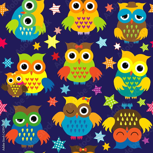 Cartoon owls in the nighttime colorful seamless pattern
