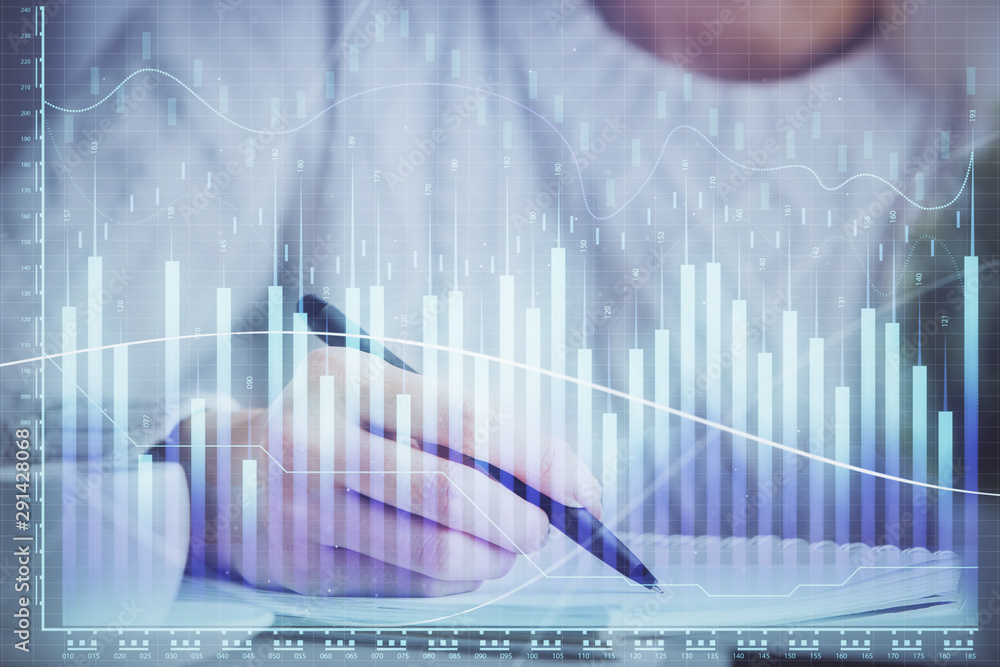 Forex chart displayed on woman's hand taking notes background. Concept of research. Multi exposure Forex chart displayed on woman's hand taking notes background. Concept of research. Multi exposure