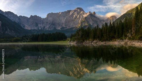 beautiful sunrise over the mountain lake in the Julian Alps