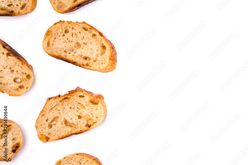Frame of pieces of white bread isolated on white background. Flat lay, top view. Copy space for your text.