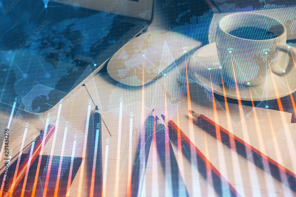 Double exposure of forex chart and work space with computer. Concept of international online trading.