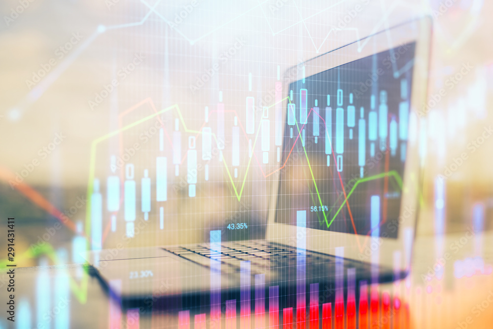 Stock market graph and table with computer background. Double exposure. Concept of financial analysis. Stock market graph and table with computer background. Double exposure. Concept of financial analysis.