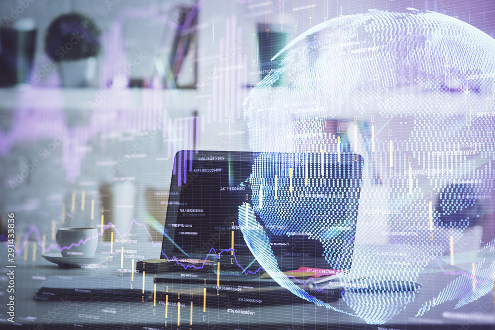 Financial graph colorful drawing and table with computer on background. Double exposure. Concept of international markets. Financial graph colorful drawing and table with computer on background. Double exposure. Concept of international markets.