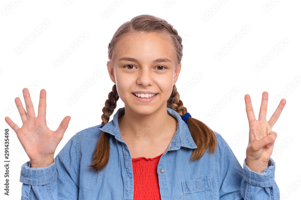 Portrait of happy teen girl showing two palms - 8 fingers, isolated on white background. Happy smiling child doing gesture of number Eight. Series of photos count from 1 to 10. Portrait of happy teen girl showing two palms - 8 fingers, isolated on white background. Happy smiling child doing gesture of number Eight. Series of photos count from 1 to 10.