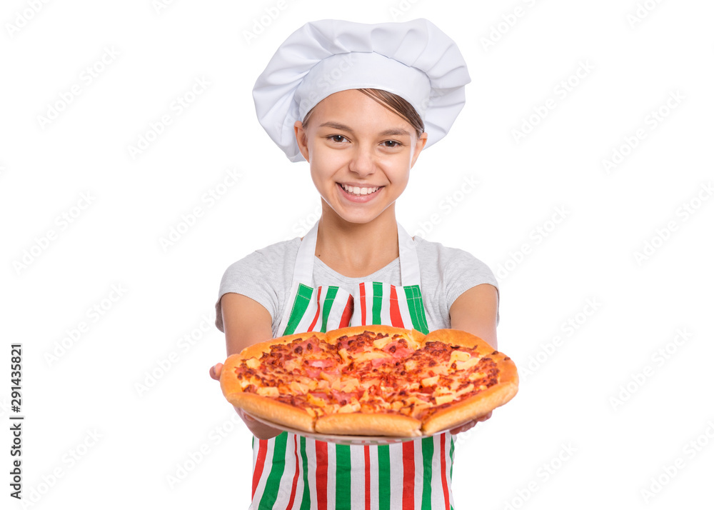 Happy beautiful teen girl in chef hat holding cooked pizza. Girl cook in apron holds plate with fresh pizza, isolated on white background. Portrait of cute child showing delicious Italian pizza. Happy beautiful teen girl in chef hat holding cooked pizza. Girl cook in apron holds plate with fresh pizza, isolated on white background. Portrait of cute child showing delicious Italian pizza.