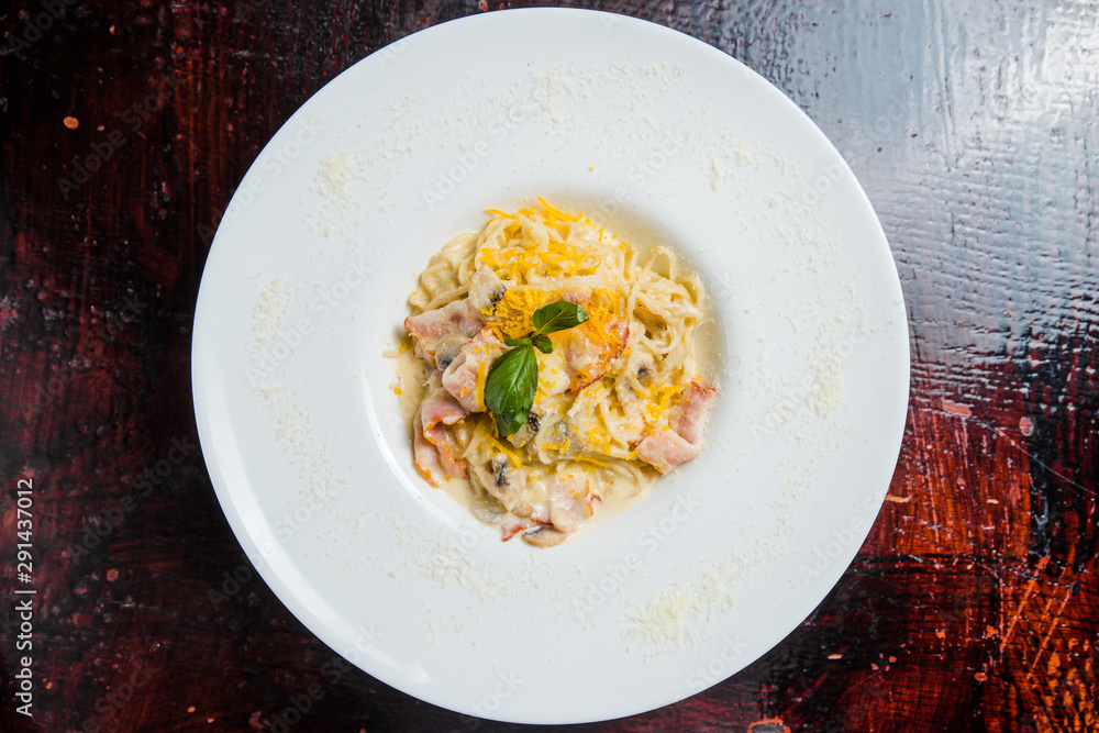 Pasta in cream sauce, Italian dinner with wine Pasta in cream sauce, Italian dinner with wine