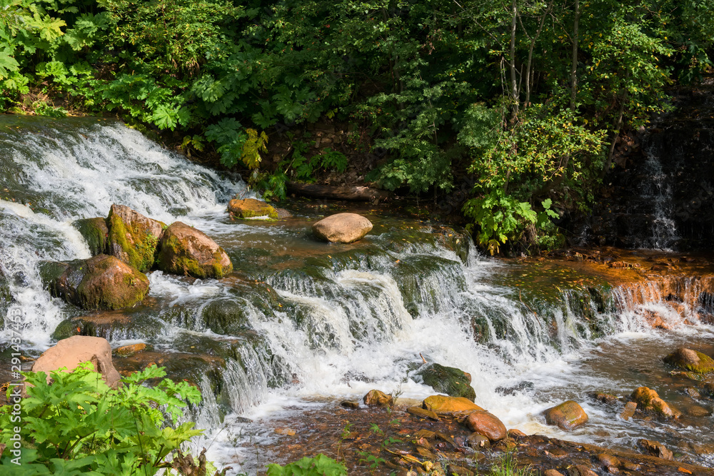 Chalpa River with a cascade of waterfalls. Russia Novgorod region, Borovichi district Chalpa River with a cascade of waterfalls. Russia Novgorod region, Borovichi district