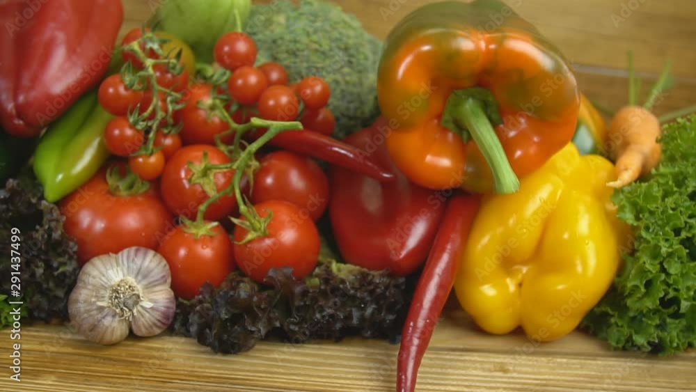 various vegetables on a wooden table various vegetables on a wooden table
