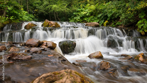 Chalpa River with a cascade of waterfalls. Russia Novgorod region, Borovichi district