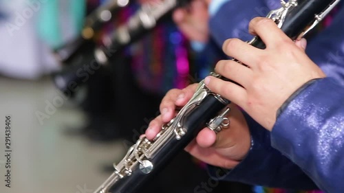 close up to musician playing the clarinet photo