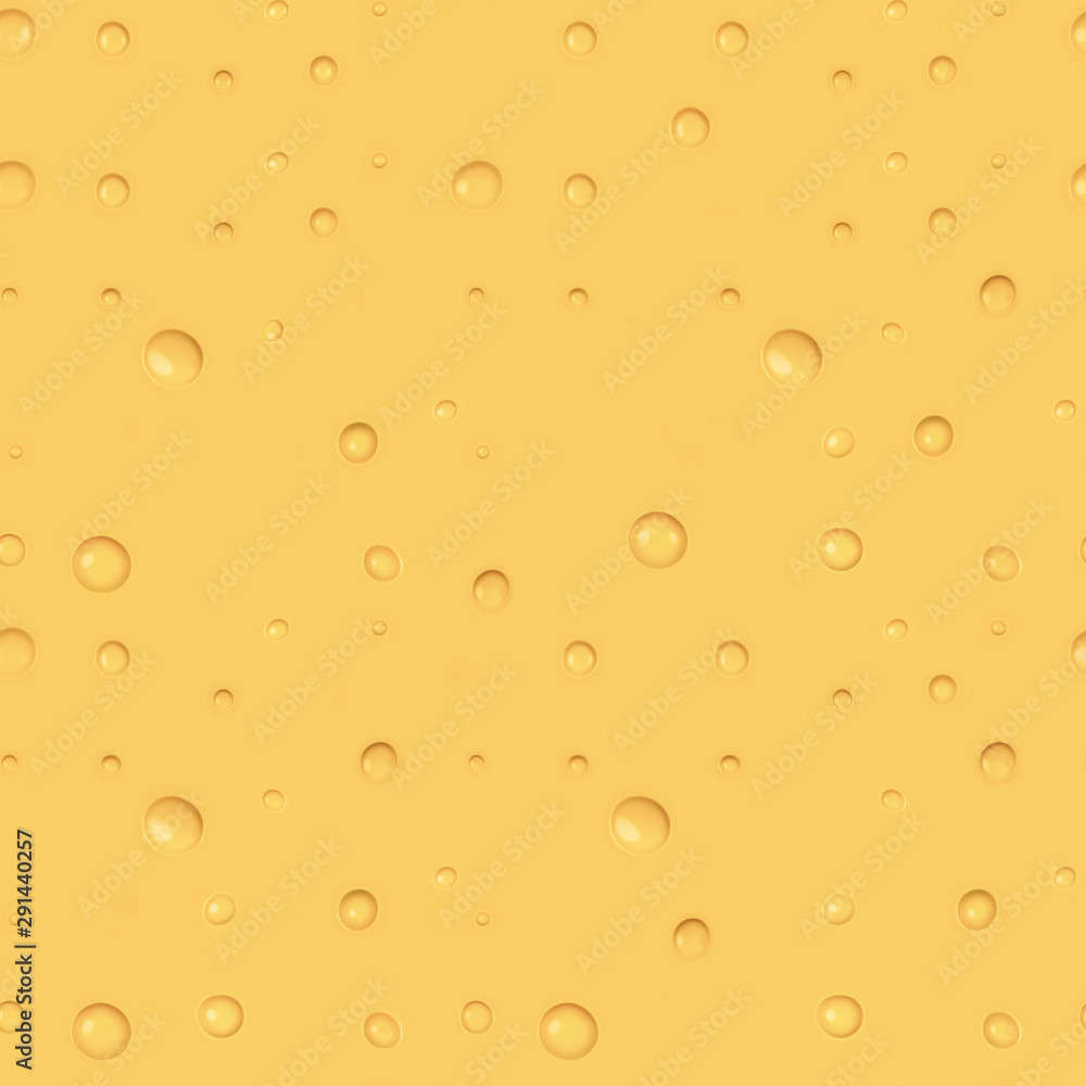 The seamless texture of bright yellow cheese.