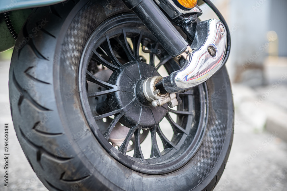 Front wheel of electric motorbike scooter. Front wheel of electric motorbike scooter.