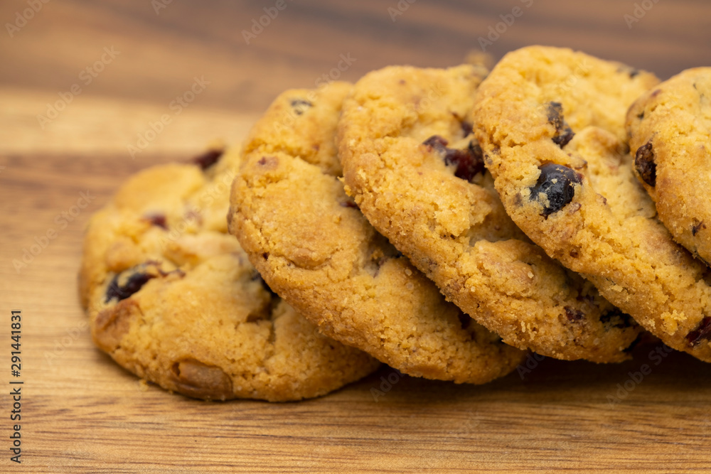 Pile of delicious tasty recipe apple cookies homemade isolated on wooden table Pile of delicious tasty recipe apple cookies homemade isolated on wooden table
