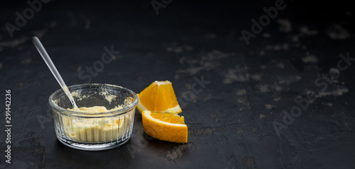 Orange fruit powder on a slate slab
