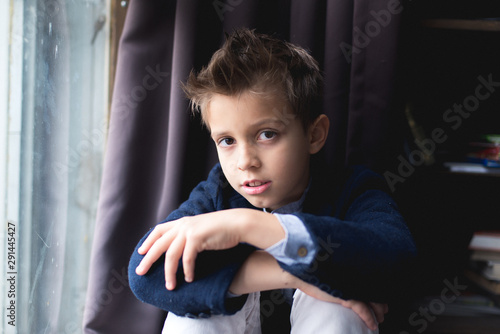 A schoolboy going to school photo