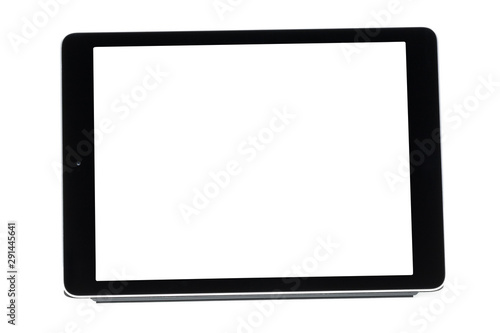 Tableta sobre fondo blanco en soporte gris vista de frente photo