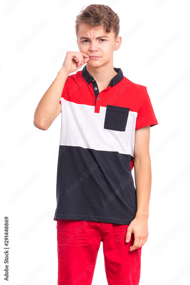 Portrait of handsome teen boy showing sign of closing mouth and silence gesture. My lips are sealed. Child showing zip gesture as if shutting mouth on key. Funny teenager isolated on white background. Portrait of handsome teen boy showing sign of closing mouth and silence gesture. My lips are sealed. Child showing zip gesture as if shutting mouth on key. Funny teenager isolated on white background.